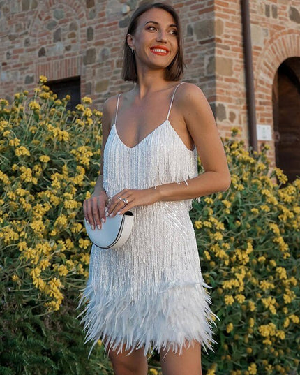 Evening dress with narrow straps and figure-hugging cut