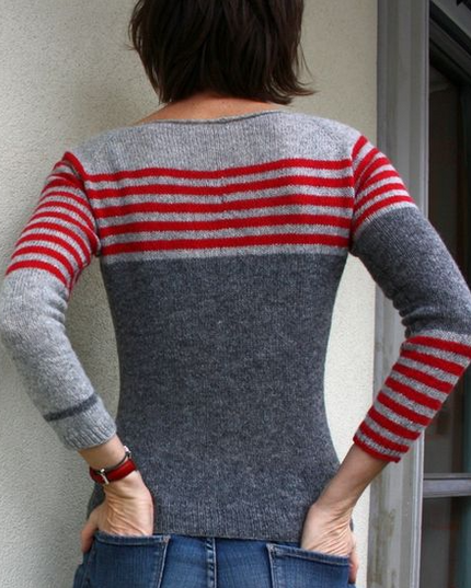 Knitted sweater with striped design